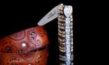 Taschenmesser Laguiole Claude Dozorme, Edition WILD ANIMALS, Wolfskopf, Damastklinge, Mammutbackenzahn braun Ansicht 1