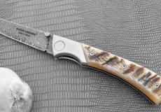 Jagdmesser Claude Dozorme, Edition MORLOS 27, Widderhorn-Kruste, Damast, brosse Taschenmesser - Handmade in France